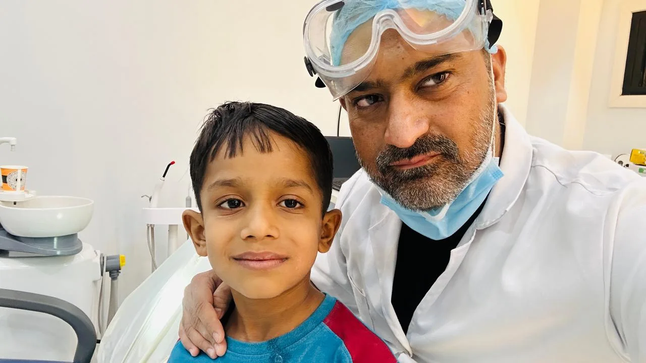 Dr. Wasim with young patient